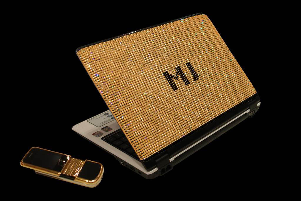 Laptop MJ Gold Swarovski Edition - Inlaid Gold Crystal Swarovski with Gold Mobile Phone. Trademark Incrusted Black Diamonds. Gift Box from Anaconda Skin.